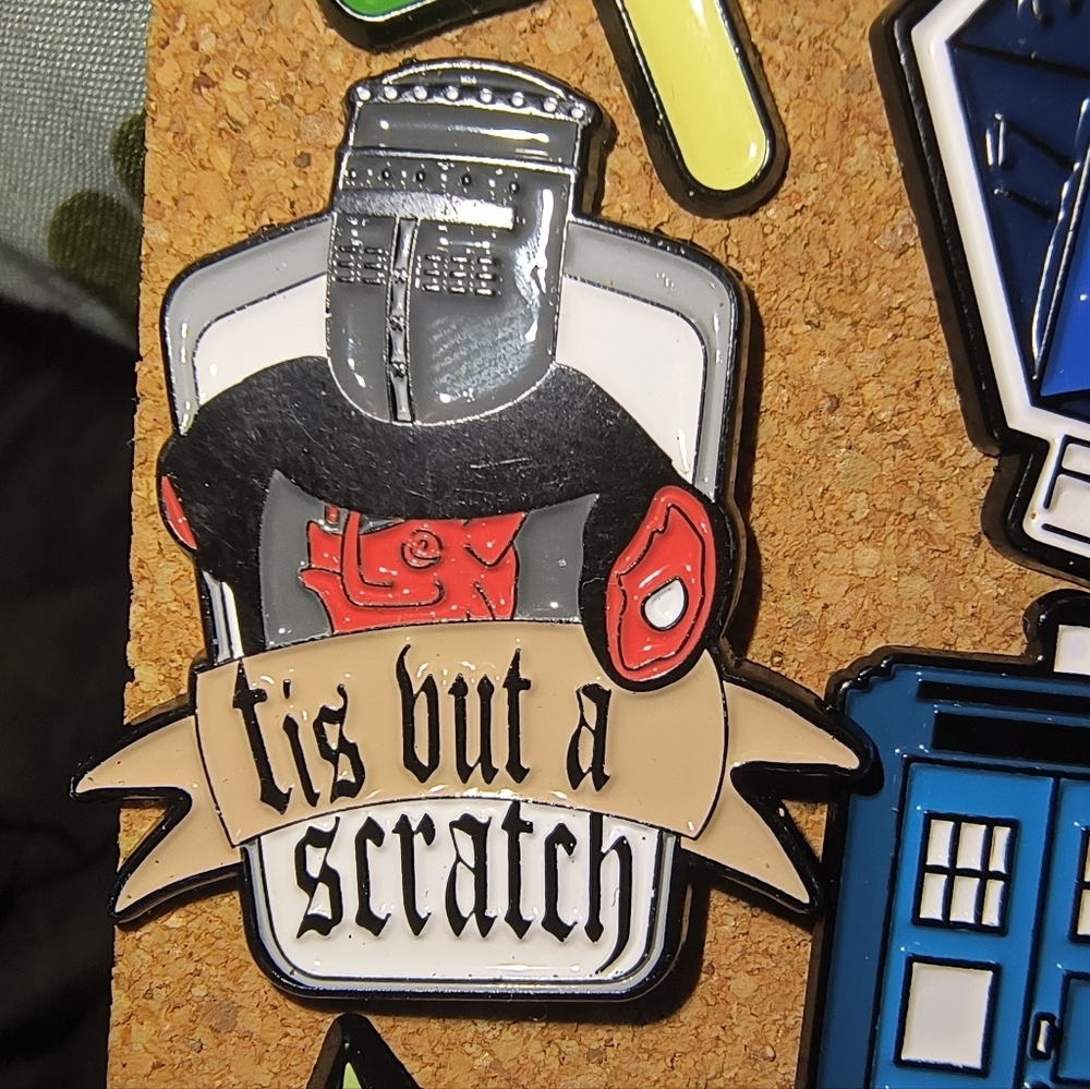 'Tis But a Scratch' Knight Helmet Enamel Pin - Black, Red, Cream, Silver